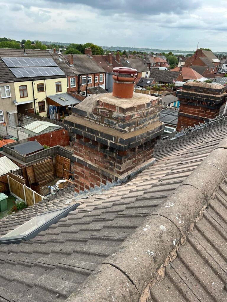 This is a photo taken from a roof which is being repaired by Histon Roofing Repairs, it shows a street of houses, and their roofs